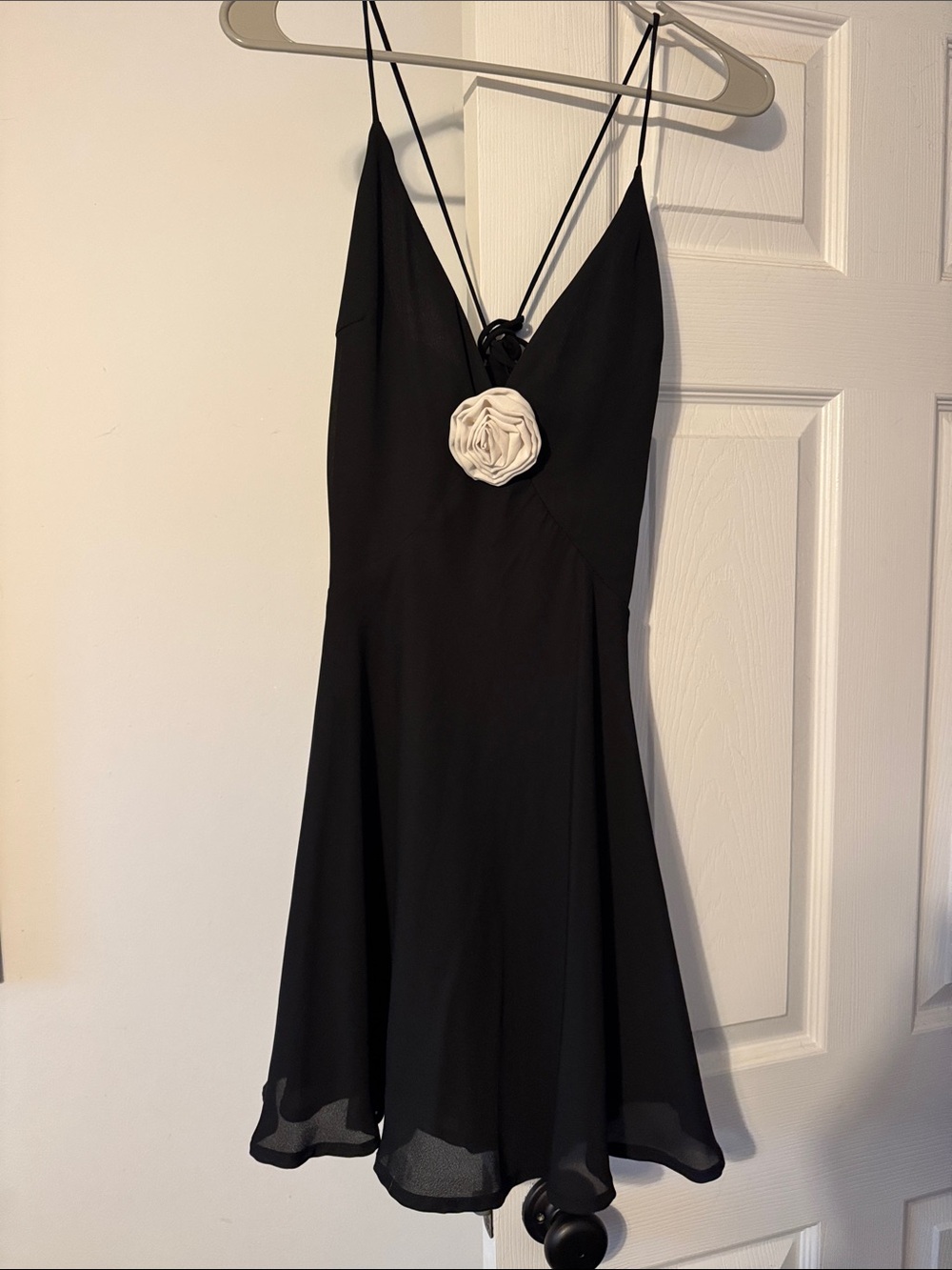 Black Mini Dress with Cream Rose Accent and Spaghetti Straps
